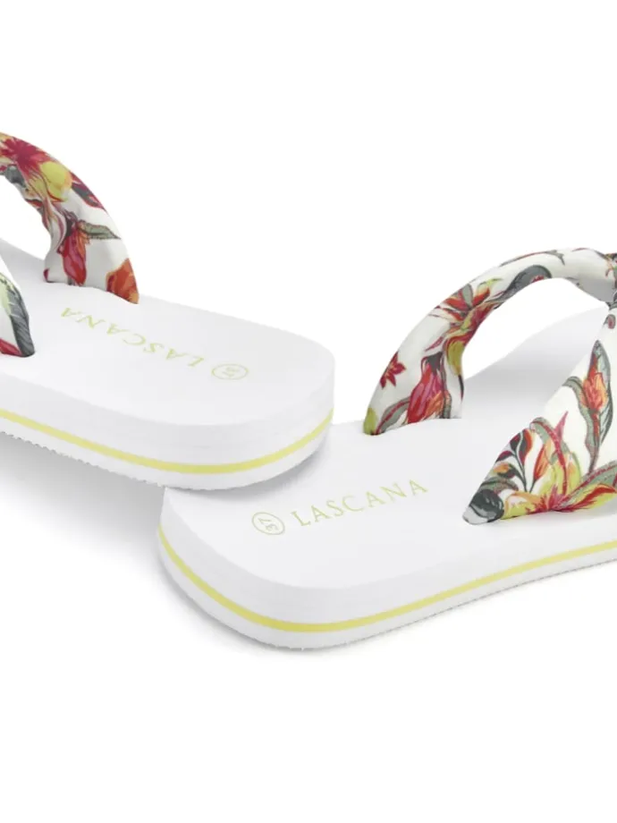 Badezehentrenner in weiß geblümt