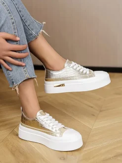 Sneakers in Weiß/ Gold